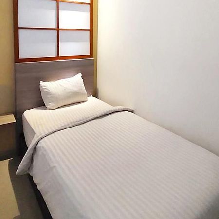 Twospaces Living At Maximus Inn Palembang Dış mekan fotoğraf