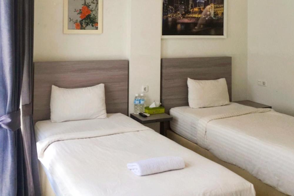 Twospaces Living At Maximus Inn Palembang Dış mekan fotoğraf
