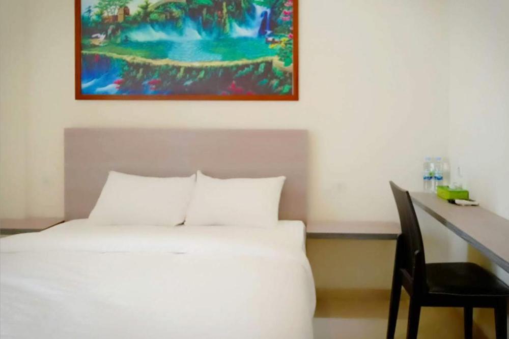 Twospaces Living At Maximus Inn Palembang Dış mekan fotoğraf